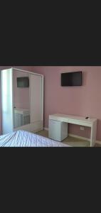 Ένα ή περισσότερα κρεβάτια σε δωμάτιο στο B&B Alice