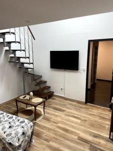 TV a/nebo společenská místnost v ubytování Appartement a 12 mn de Cauterets