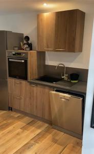 Kuchyň nebo kuchyňský kout v ubytování Appartement a 12 mn de Cauterets