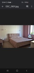 Ένα ή περισσότερα κρεβάτια σε δωμάτιο στο B&B Alice
