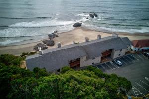 an aerial view of a building on the beach at Ester Lee Motel in Lincoln City