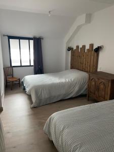 Postel nebo postele na pokoji v ubytování Appartement a 12 mn de Cauterets