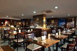 En restaurant eller et andet spisested på Quality Suites Vila Velha