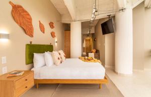 Кровать или кровати в номере Casa Insurgentes by Kukun