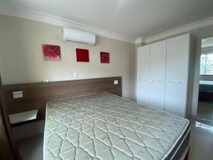 מיטה או מיטות בחדר ב-182G - Excelente cobertura em condomínio completo