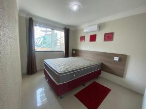 Tempat tidur dalam kamar di 182G - Excelente cobertura em condomínio completo