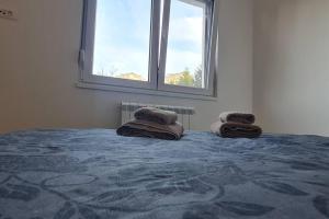 Tempat tidur dalam kamar di Amar 4