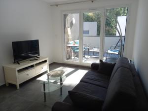 Μια τηλεόραση ή/και κέντρο ψυχαγωγίας στο Lodge coeur nature T3