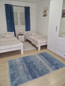 Posteľ alebo postele v izbe v ubytovaní Mendula