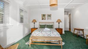 Voodi või voodid majutusasutuse MaiMoana - Hatfields Beach Cliff-Top Retreat toas
