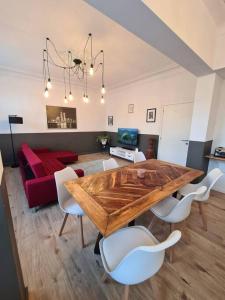 Posezení v ubytování Duplex dans le centre d'Heusy