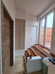 Postel nebo postele na pokoji v ubytování Duplex dans le centre d'Heusy + 3 fotografie