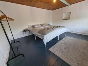 Postel nebo postele na pokoji v ubytování Duplex dans le centre d'Heusy