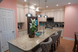 a kitchen with a large island with a counter top at The Relaxation Getaway in Savannah