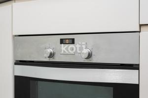 A kitchen or kitchenette at Koti Rentals - Gamycol 2