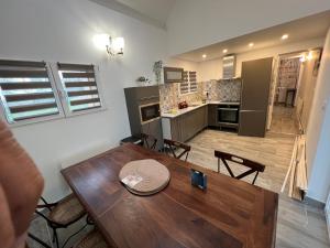 Kuchyň nebo kuchyňský kout v ubytování Les maisons du phare + 15 fotografií