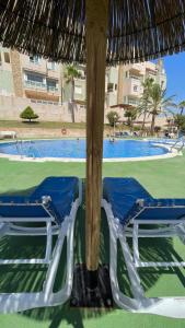 Piscina en o cerca de Cala AZUL Gran Terraza con BBQ