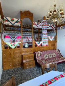 a bedroom with a dresser and a mirror at Cactus villa in Karpathos Town
