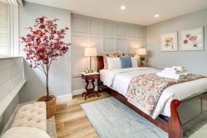 a bedroom with a bed and a tree in it at Charming Alexandria Vacation Rental in Old Town! in Alexandria