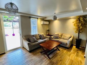 Posezení v ubytování Modern Condo in Ecovivienda