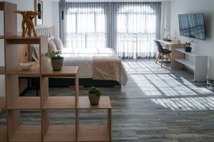 Postel nebo postele na pokoji v ubytování 86 suites