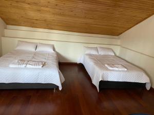 Postel nebo postele na pokoji v ubytování Hospedaje Casa Lola