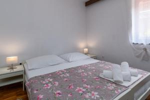 Postel nebo postele na pokoji v ubytování Apartments with parking spaces Crikvenica - 5494