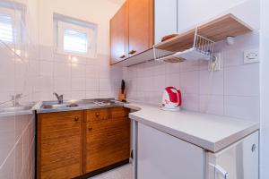 Kuchyň nebo kuchyňský kout v ubytování Apartments with parking spaces Crikvenica - 5494