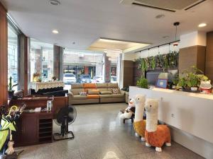 Posezení v ubytování Jia-Jia Business Hotel + 37 fotografií