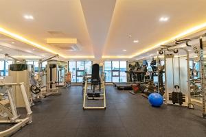 a gym with several treadmills and machines at Pohang A1Hotel Haedo in Pohang