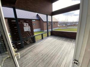 a view from the outside of a house with a deck at Aster in Kutchan