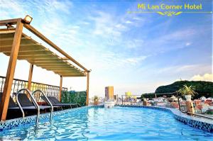 a swimming pool on the roof of a hotel at Mi Lan Villa Hotel in Vung Tau +34 photos