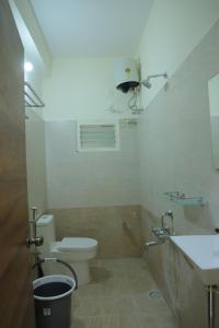 Koupelna v ubytování Padma Homes Stay- Luxury Service Apartment 1BHK & 2BHK & 3BHK