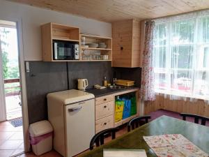 Kuchyň nebo kuchyňský kout v ubytování Glamping Hnačov