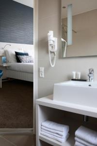 Postel nebo postele na pokoji v ubytování Hotel Zeerust Texel