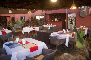 Restaurace v ubytování Hôtel Sarimanok