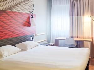 Postel nebo postele na pokoji v ubytování Hotel ibis Dijon Centre Clemenceau