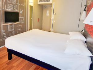 Postel nebo postele na pokoji v ubytování Hotel ibis Dijon Centre Clemenceau