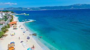 an aerial view of a beach and the ocean at Garma in Slatine