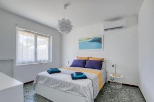 Postel nebo postele na pokoji v ubytování Villa Coquelicot - Maison climatisée avec piscine + 15 fotografií