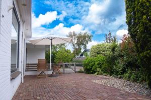 Κήπος έξω από το Vakantiebungalow Limmen