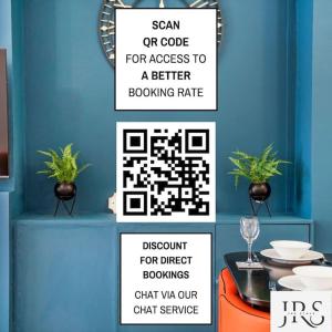 two signs with a qr code for a better boating rate at The Marsden - Modern 3 bed, Virgin TV, WIFI in Edmonton