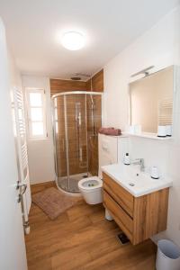 Koupelna v ubytování Apartmani Kac
