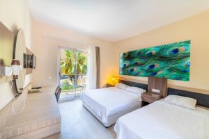 เตียงในห้องที่ Adrasan Beach Club +37 ภาพ