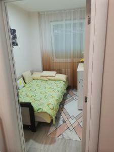 Posteľ alebo postele v izbe v ubytovaní Stan na Dan Obrenovac