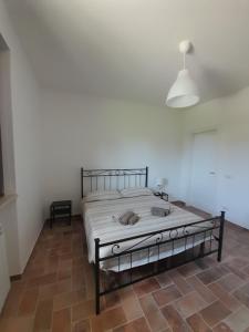 Postel nebo postele na pokoji v ubytování Serroni Alto