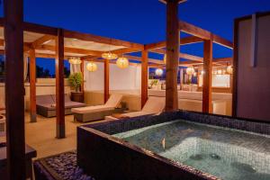 an outdoor jacuzzi tub in a house at Kahena Lifestyle Concept in Marrakesh