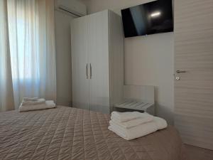 Postel nebo postele na pokoji v ubytování Maresol Residence