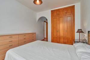 Posteľ alebo postele v izbe v ubytovaní Beachfront apartment Torrox Costa