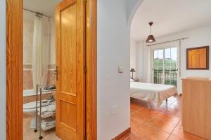 Posteľ alebo postele v izbe v ubytovaní Beachfront apartment Torrox Costa